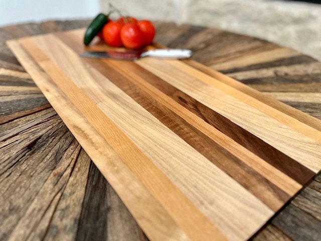 Custom Walnut, Maple and Cherry 26” X 12 1/8” Cutting Board with a long sleek low profile design. XL size for Brisket and Ribs.