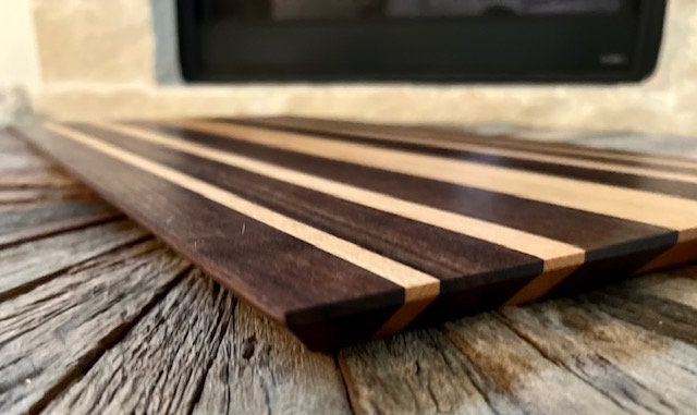 Custom one of a kind 24” X 12 3/4” Cutting Board Walnut and Beach Wood Long sleek low profile design. XL size for Briskets and Ribs.