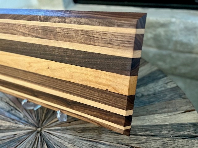 Custom one of a kind 24” X 12 3/4” Cutting Board Walnut and Beach Wood Long sleek low profile design. XL size for Briskets and Ribs.