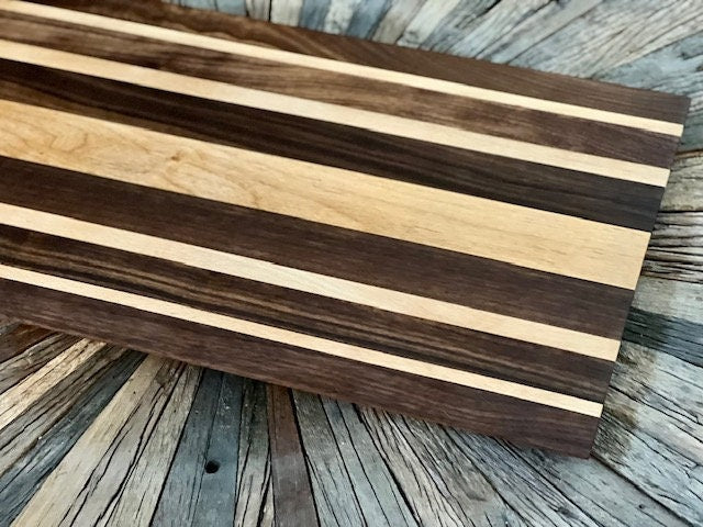 Custom one of a kind 24” X 12 3/4” Cutting Board Walnut and Beach Wood Long sleek low profile design. XL size for Briskets and Ribs.