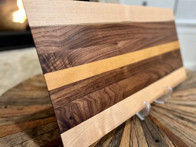 Custom one of a kind 25” X 12.75” Cutting Board Walnut, Cherry and Maple Long sleek low profile design. XL size for Brisket and Ribs.