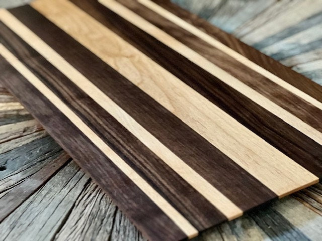 Custom one of a kind 24” X 12 3/4” Cutting Board Walnut and Beach Wood Long sleek low profile design. XL size for Briskets and Ribs.