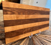 Walnut and Cherry Wood 26 3/4” wide 12 3/4” tall 1” thick Very beautifully done classic cutting board. XL size for Briskets and Ribs